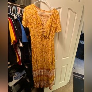 Never worn floor length flowing dress. Very cute, just needs to be steamed